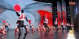 25 humanoid robots competed in swordplay with children in China